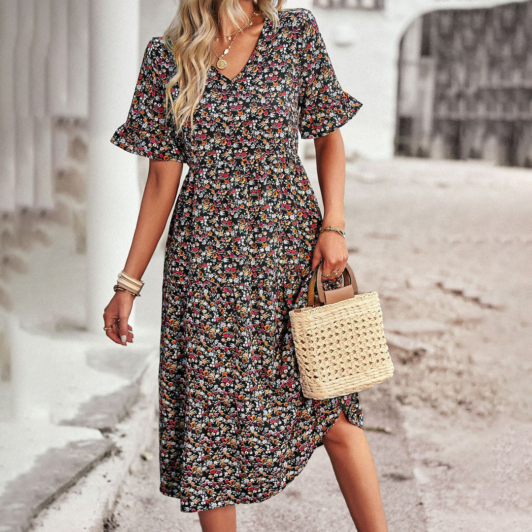 EMERY - Zomerse gebloemde midi-jurk
