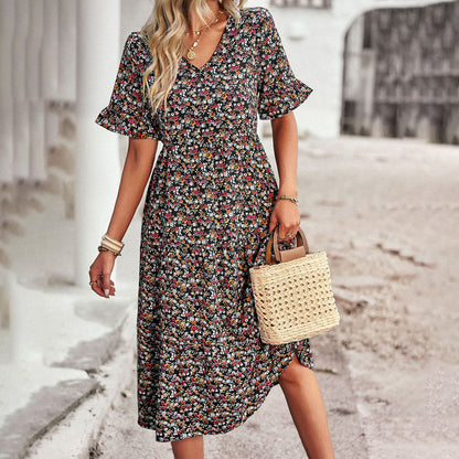 EMERY - Zomerse gebloemde midi-jurk