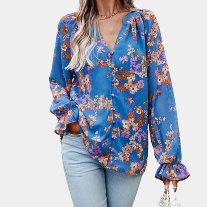 Elegante zomerse gebloemde damesblouse