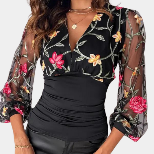 Elegante zomerse damestop met bloemenborduursel