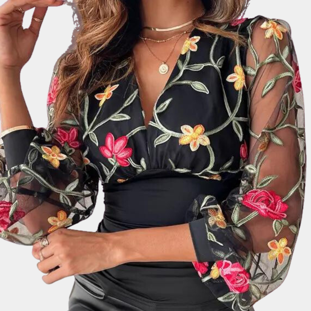 Elegante zomerse damestop met bloemenborduursel