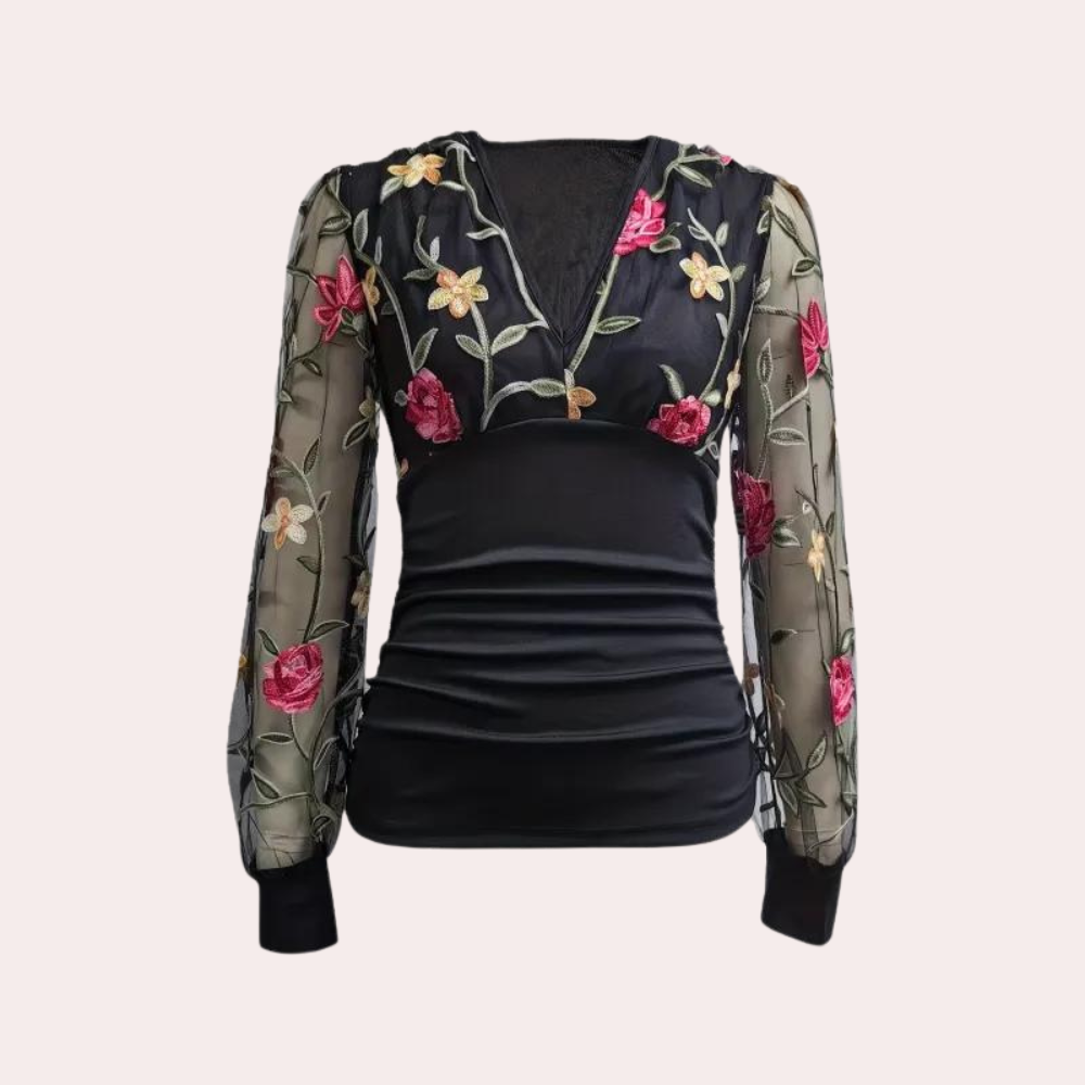 Elegante zomerse damestop met bloemenborduursel