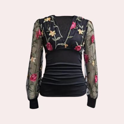 Elegante zomerse damestop met bloemenborduursel