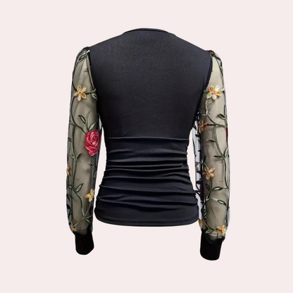 Elegante zomerse damestop met bloemenborduursel